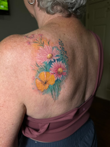 Explore swimming tattoo ideas, creative tattoo ideas in Tampa, available at Shades of Blak Studios LLC
