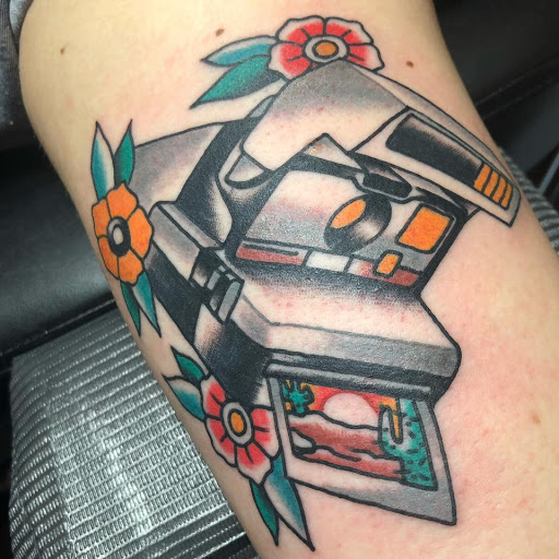 Explore cover up tattoo ideas on chest, creative tattoo ideas in Lakeland, available at Black Swan Tattoo