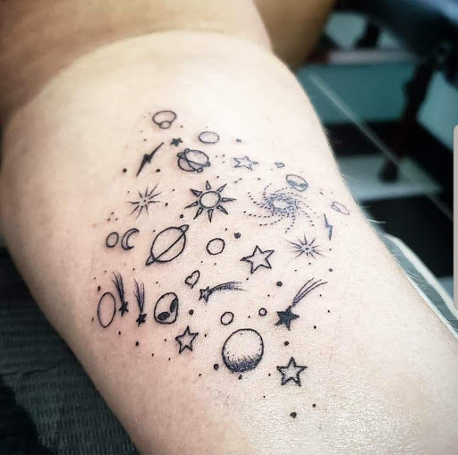 Explore small snake tattoo ideas, creative tattoo ideas in Jupiter, available at Moth And Moon Tattoo