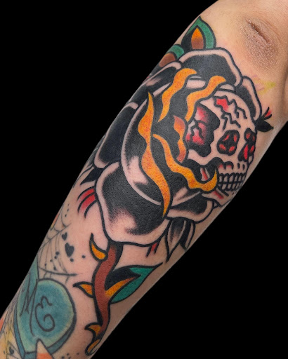 Explore frog tattoo ideas, creative tattoo ideas in Johnson City, available at Gold Cross Tattoo Co.