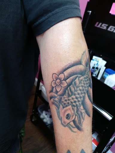 Explore trolls tattoo ideas, creative tattoo ideas in Calhoun, available at Velvet Panther Tattoo and Piercing