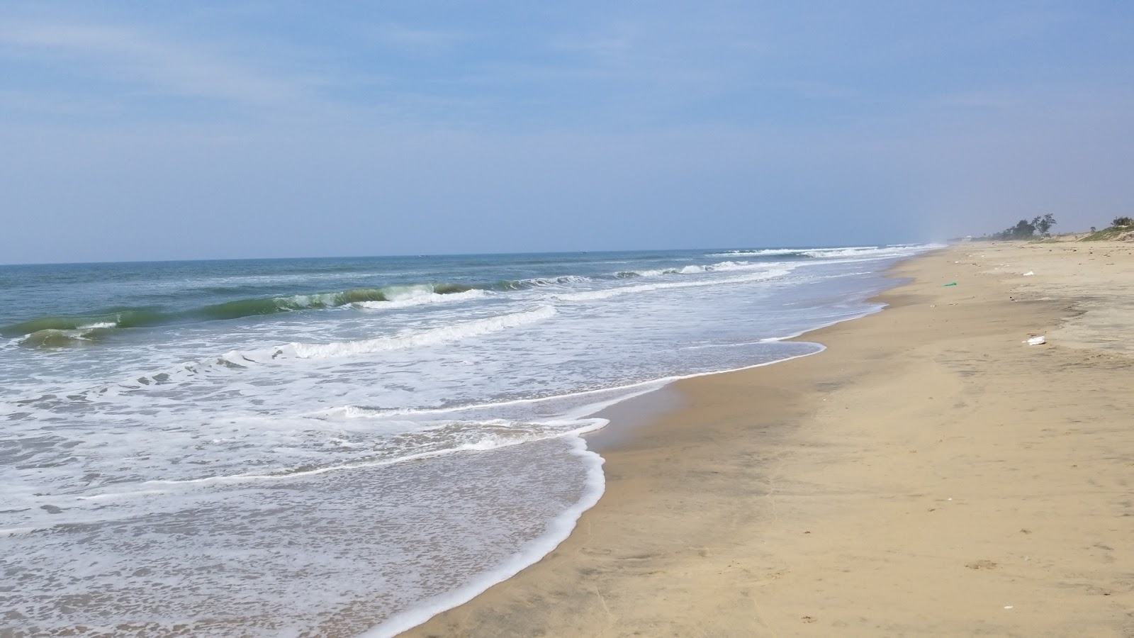 Fotografija Thirtavari Beach z dolga ravna obala