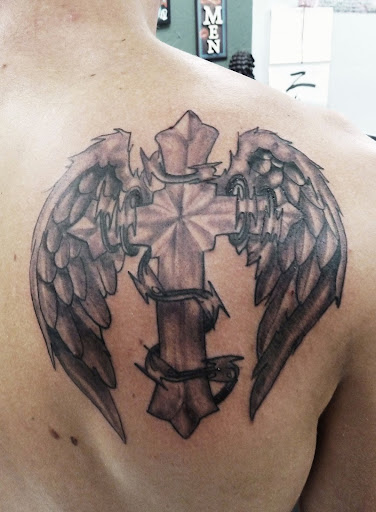 Explore baby yoda tattoo ideas, creative tattoo ideas in Sarasota, available at Z-Edge Tattoo and Body Piercing North Shop