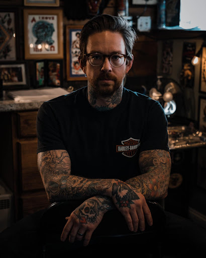 Explore meaningful elegant spine tattoo ideas, creative tattoo ideas in Paducah, available at Third Moon Tattoos
