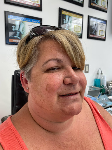 Explore crucifix tattoo ideas, creative tattoo ideas in Myrtle Beach, available at Professional Body Piercing by Jackie