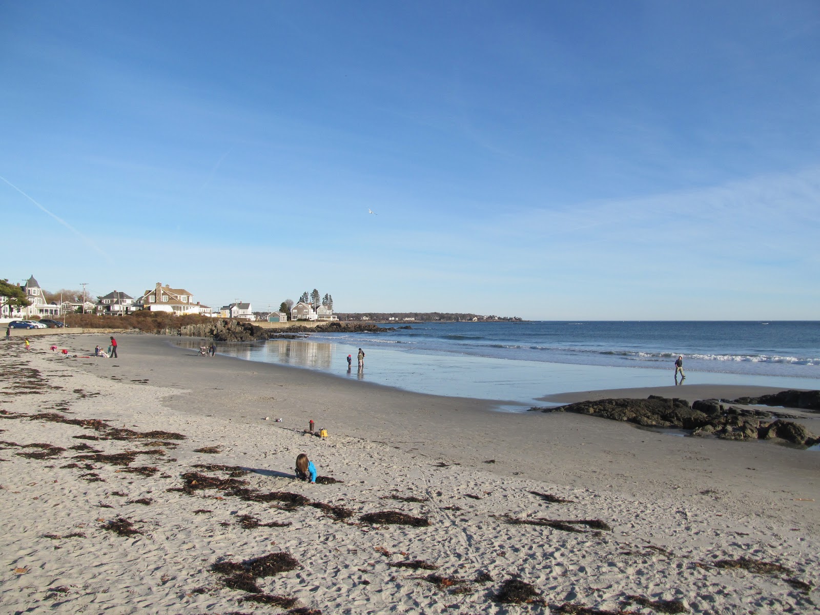 Fotografija Mother's beach z svetel pesek površino