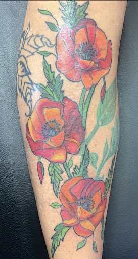 Explore skull tattoo ideas for guys, creative tattoo ideas in Springfield, available at Anchored Ink Tattoo & Piercing by SPLAT LLC