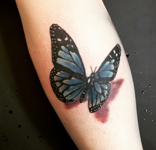 Explore ripped skin tattoo ideas, creative tattoo ideas in Springfield, available at Ohio Tattoo Co