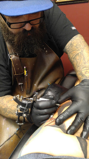 Explore pansy tattoo ideas, creative tattoo ideas in Fayetteville, available at Chop Shop Tattoo