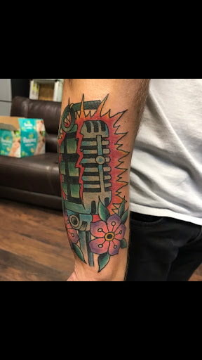 Explore snake tattoo idea, creative tattoo ideas in San Angelo, available at Good Vibes Only Tattoo Studio