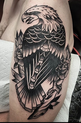 Explore hibiscus flower tattoo ideas, creative tattoo ideas in Cedar Falls, available at The Iron Quill Tattoo Parlor