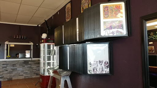 Explore woman leg tattoo ideas, creative tattoo ideas in Hazard, available at Electric Chair Tattoo