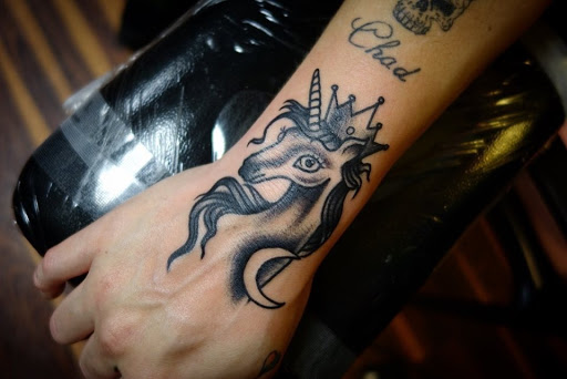 Explore tattoo cover up ideas on hand, creative tattoo ideas in Orange Park, available at Big City Tattoo and Piercing