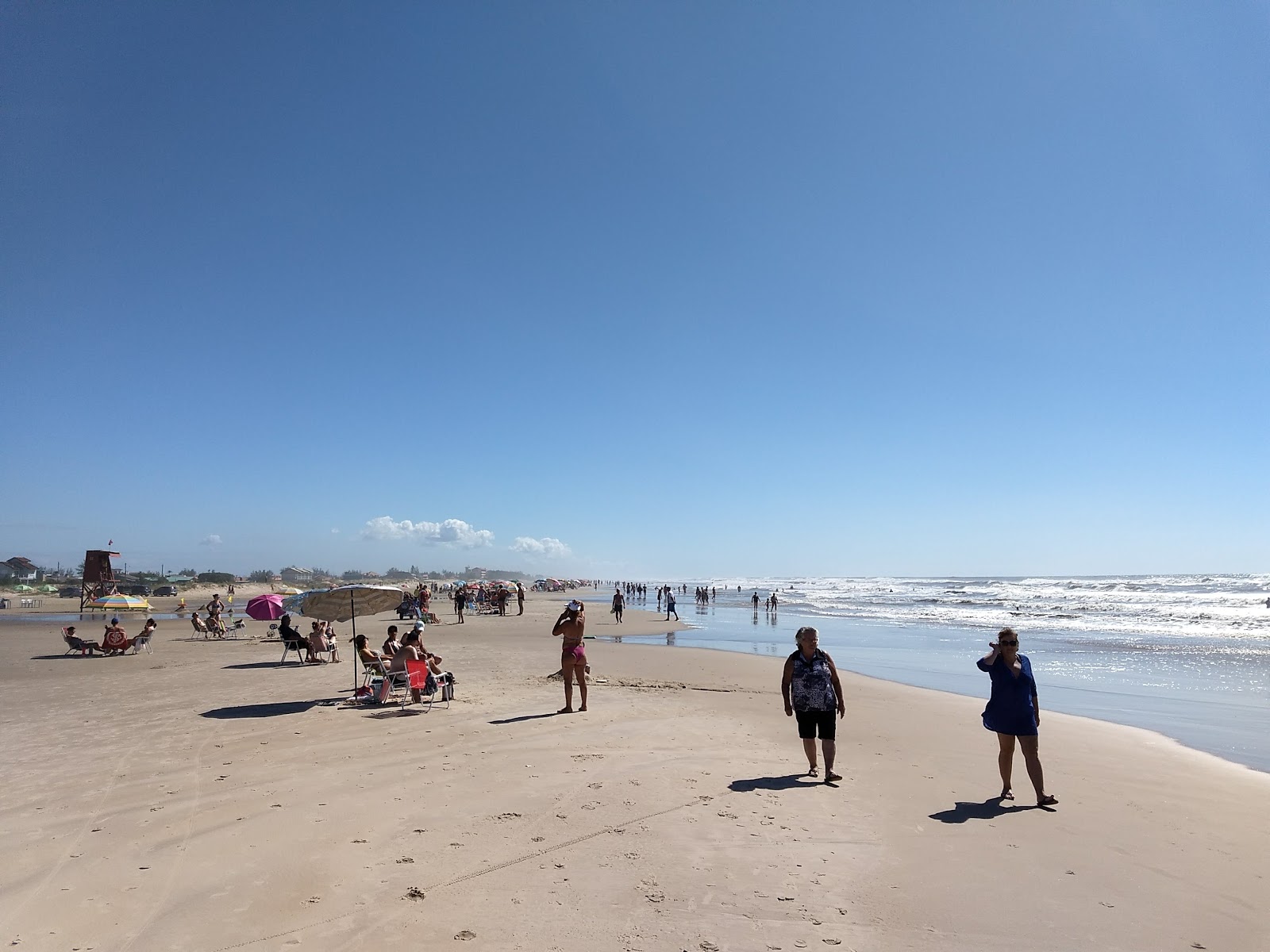 Foto av Arroio do Sal stranden med turkosa vatten yta