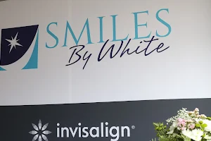 Smiles By White image