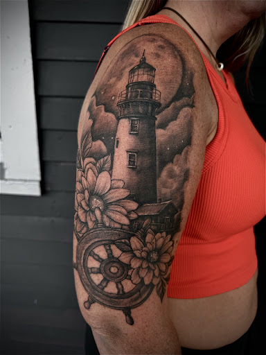 Explore camera tattoo ideas, creative tattoo ideas in Fort Oglethorpe, available at The Helm Tattoo & Piercing