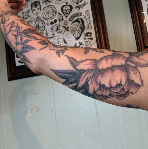Explore dumb tattoo ideas, creative tattoo ideas in Lawrence, available at Standard Electric Tattooing
