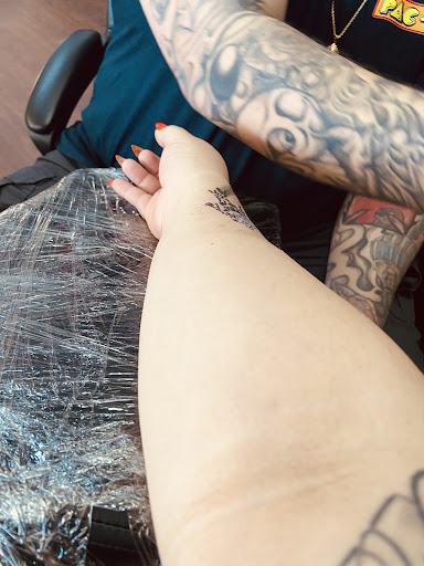 Find small sun tattoo ideas for your next unique tattoo in Visalia at Sanctum Tattoo Studio