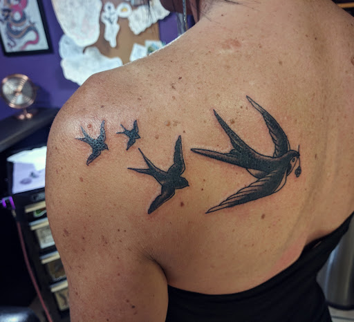 Explore eagles tattoo ideas, creative tattoo ideas in Vincennes, available at Silver Owl Tattoo