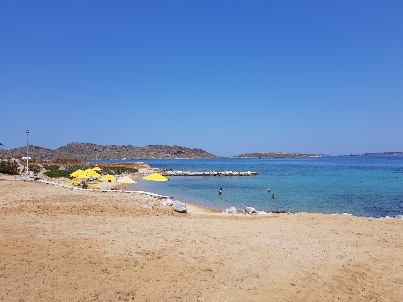 Photo of Porto Paros beach with turquoise pure water surface