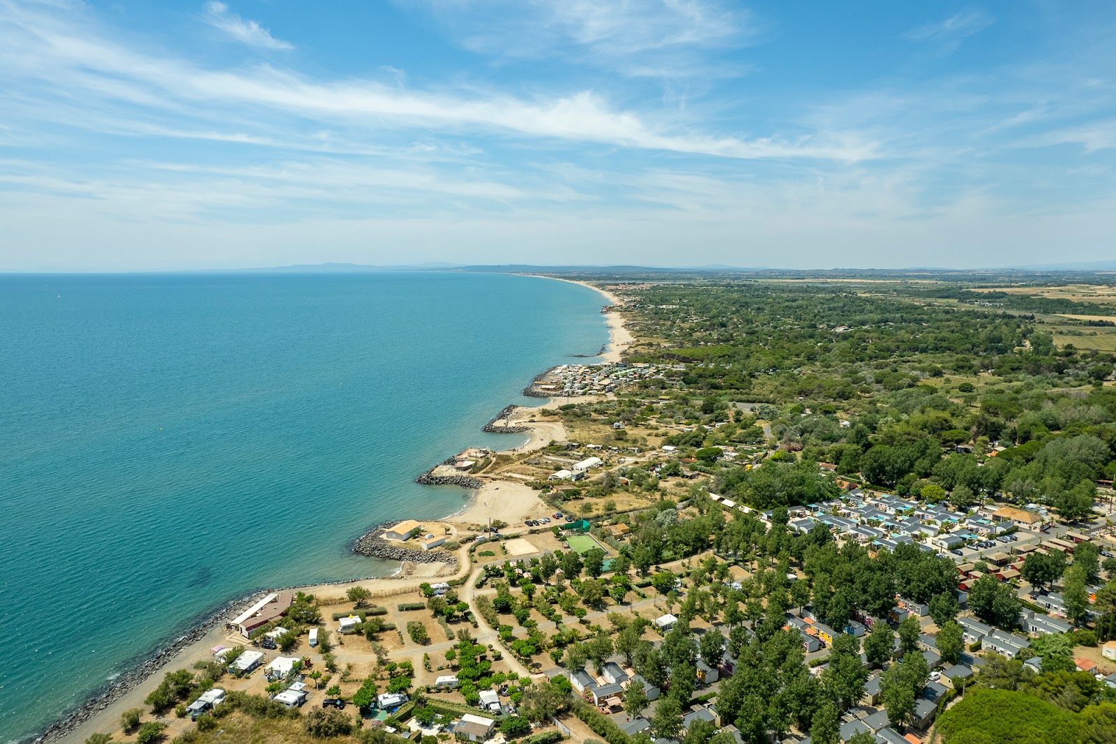 Photo de Roucan Beach avec un rivage spacieux