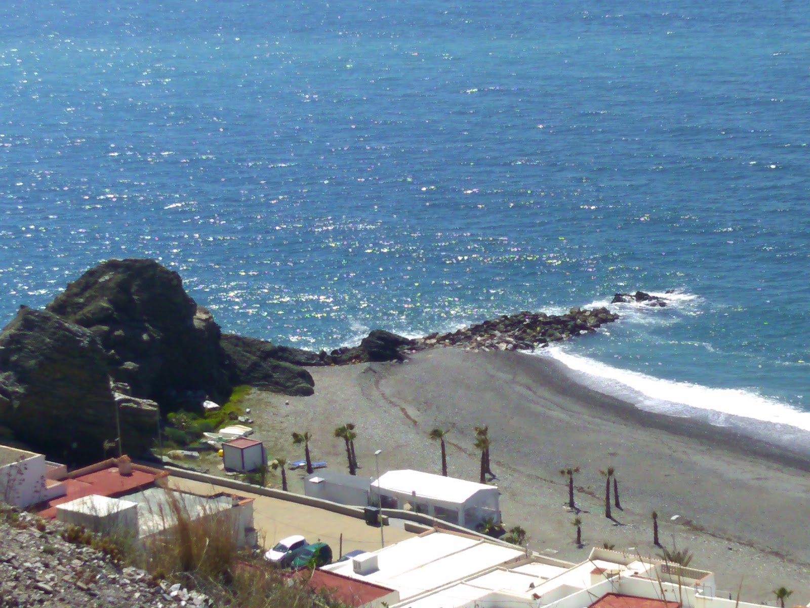 Foto di Playa de Melicena con parzialmente pulito livello di pulizia