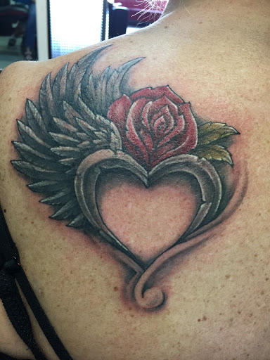 Explore tattoo ideas for covering up name, creative tattoo ideas in West Fargo, available at Addictions Collective Studios