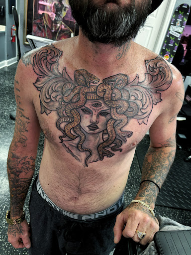 Explore cover up tattoo ideas on hip, creative tattoo ideas in Fort Myers, available at Loyal 2 The Coil Tattoos & Piercings (Edison Mall Location Entrance F)