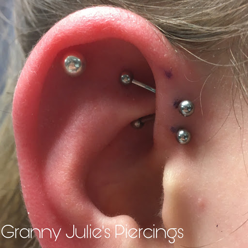 Explore cover up tattoo ideas for upper back, creative tattoo ideas in Kent, available at War Horse Ink