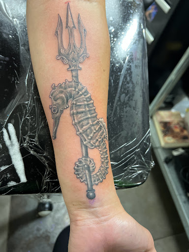 Find cute tattoo ideas for black females for your next unique tattoo in Pleasantville at The Black Pearl Tattoo Co.