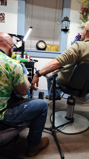 Tattoo Shop «Raining Ink», reviews and photos, 420 W 7th St, Columbia, TN 38401, USA