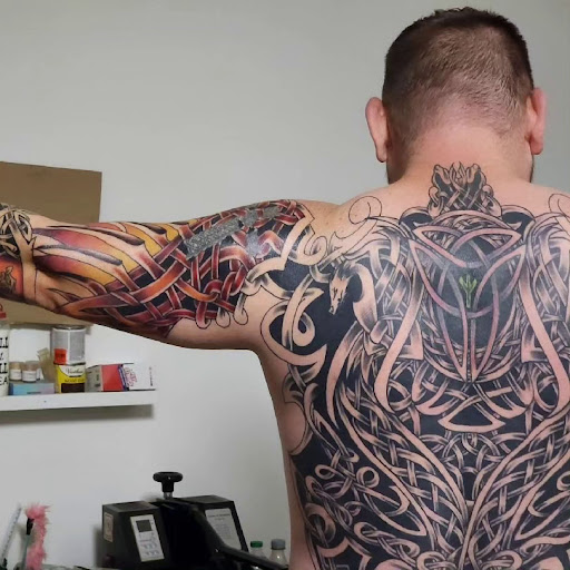 Explore leg tattoo men ideas, creative tattoo ideas in Egg Harbor Township, available at The Inkuisition