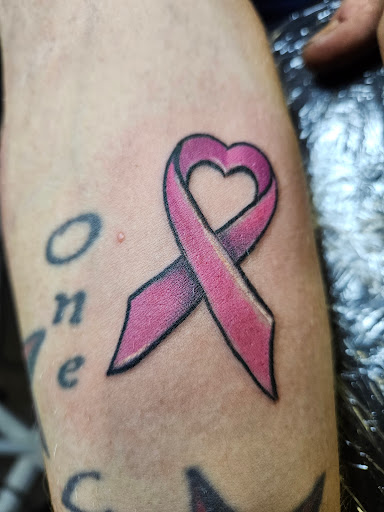 Explore hip tattoo ideas for women, creative tattoo ideas in Angola, available at Hoodlum Ink