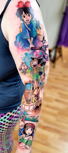 Explore broken heart tattoo ideas for guys, creative tattoo ideas in Benton, available at Spectrum Tattoo