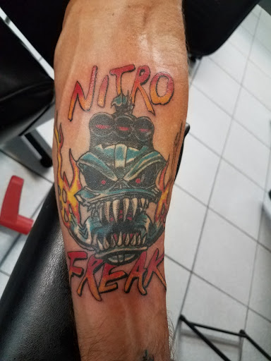 Explore black panther party tattoo ideas, creative tattoo ideas in Brandon, available at Pinup Tattoo Studio