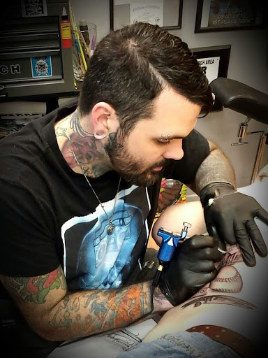 Explore never give up tattoo ideas, creative tattoo ideas in Wheeling, available at SPFX Tattoo