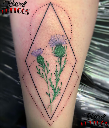 Explore tattoos ideas for black females, creative tattoo ideas in Brighton, available at Inkwell Tattoos