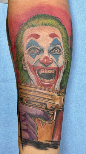 Explore upper arm men tattoo ideas, creative tattoo ideas in Honolulu, available at Sacred Art Tattoo Waikiki