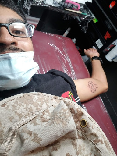 Tattoo Shop «Wildlife Tattoo», reviews and photos, 7149 Winnetka Ave, Winnetka, CA 91306, USA