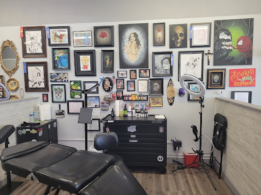 Explore front neck tattoo ideas, creative tattoo ideas in North Branch, available at Misguided Angel Tattoo Studio