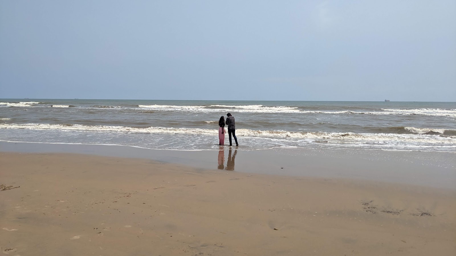 Foto de Nemam Beach com linha costeira longa e reta
