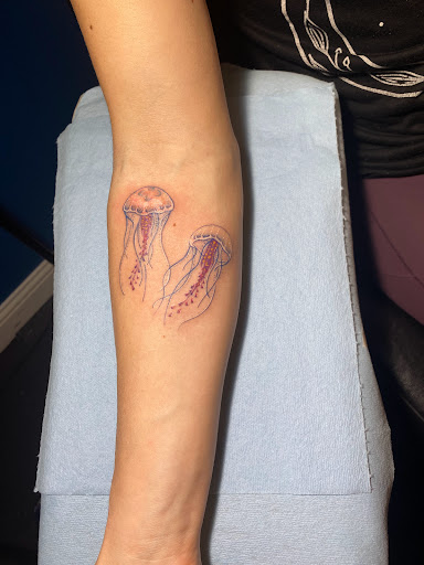 Explore singer tattoo ideas, creative tattoo ideas in Baker City, available at Blue Lotus Tattoo