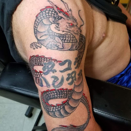 Tattoo Shop «Chicky Tattwo Tattoo Parlor», reviews and photos, 2001 W Main St, Leesburg, FL 34748, USA