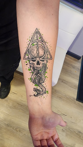 Explore graduation cap tattoo ideas, creative tattoo ideas in Northfield, available at Signature Tattoo and Supplies