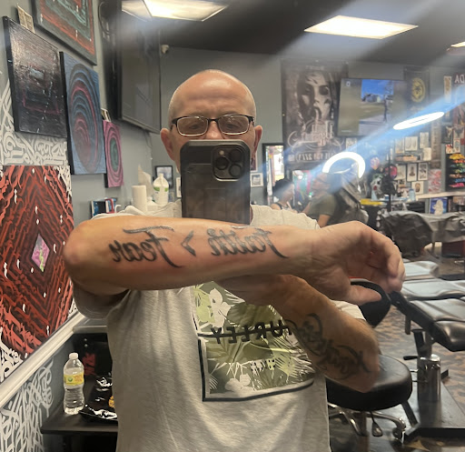 Explore psych tattoo ideas, creative tattoo ideas in Arlington, available at Urbans Tattoo & Piercing Studio