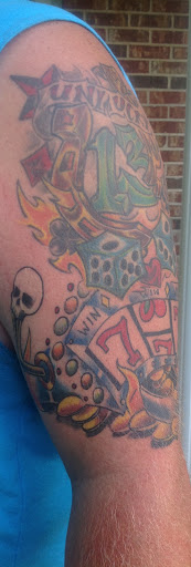 Explore leg tattoo cover up ideas, creative tattoo ideas in Anderson, available at FearlessTattoos and Piercing