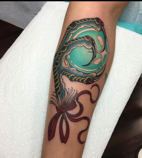 Explore wrist cross tattoo ideas, creative tattoo ideas in Saint Petersburg, available at Buku Tattoo Studio