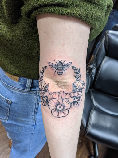 Explore nirvana tattoo ideas, creative tattoo ideas in Dallas, available at Lizards Ink Tattoo and Piercing