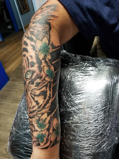 Explore side face tattoo ideas, creative tattoo ideas in Abilene, available at Ink Image Tattoos