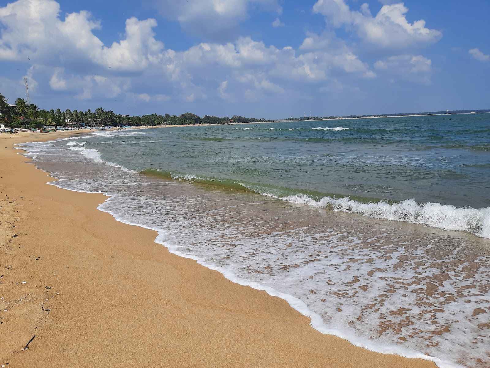 Foto de Peanut Farm Beach con recta y larga